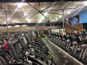 Members working out on the gym floor at a beginner-friendly Just Move location