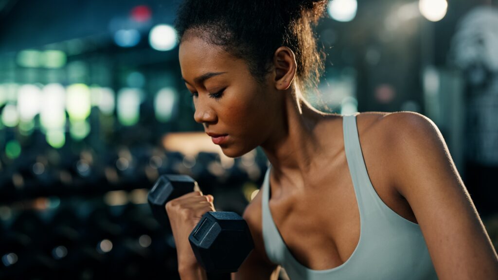 Woman following a beginner gym workout plan during a strength training session at Just Move in Lakeland